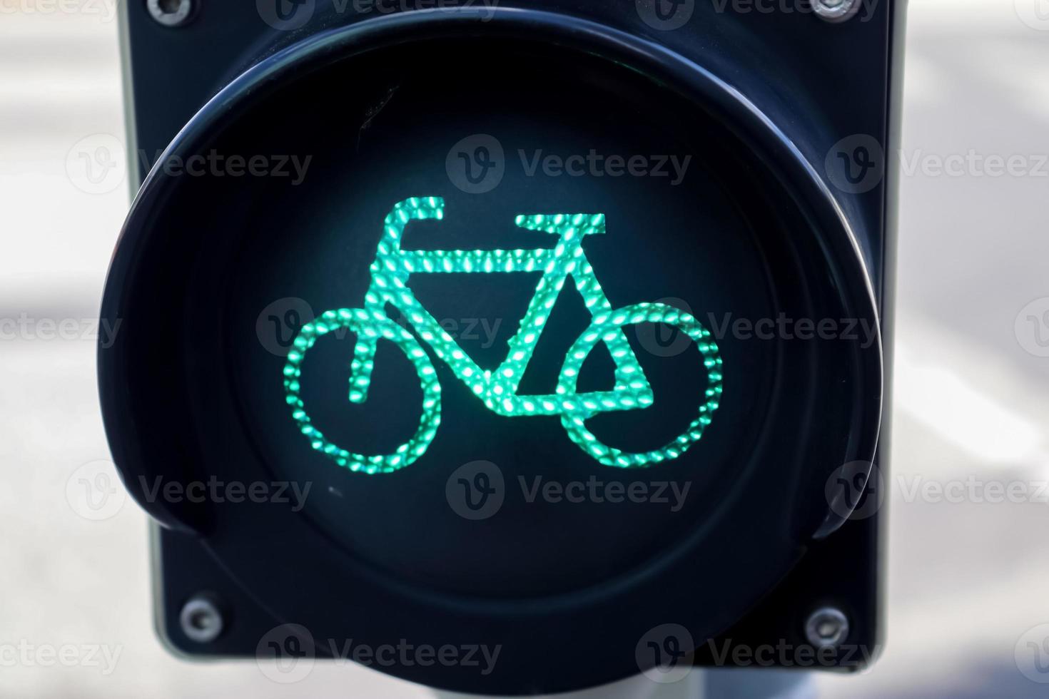 Green and red traffic lights for pedestrian and bicycles photo