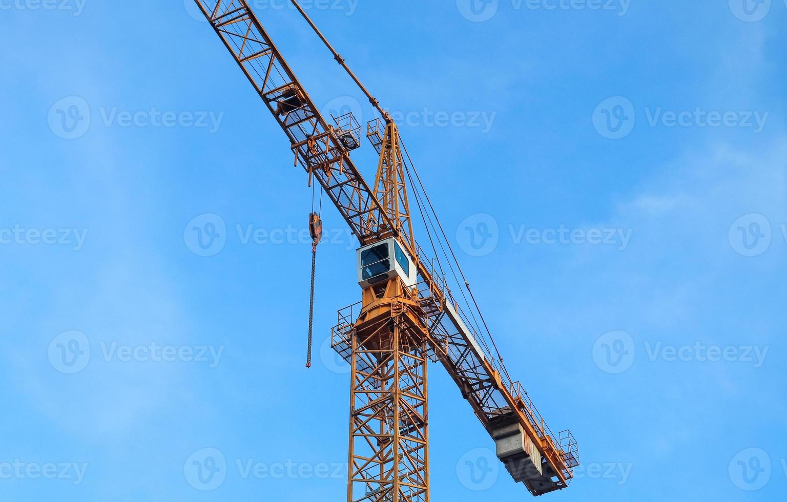 Several cranes on constructions sites at high buildings all over Europe photo