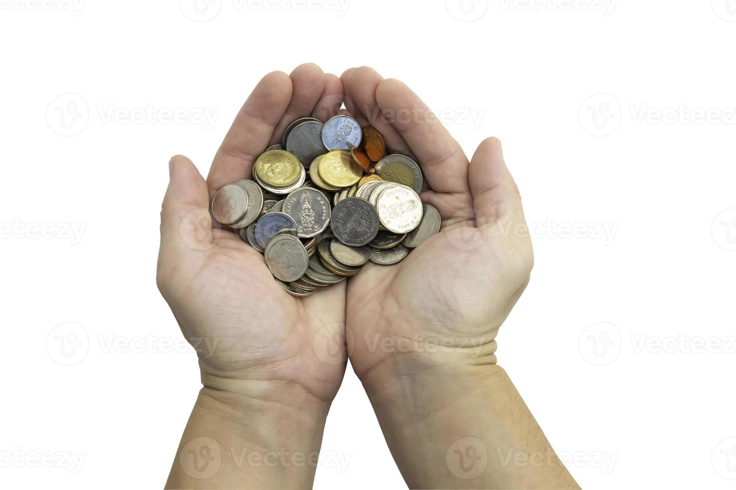 A coin in the hands of a white Asian man against on white background with clipping path. Concept of saving money. photo