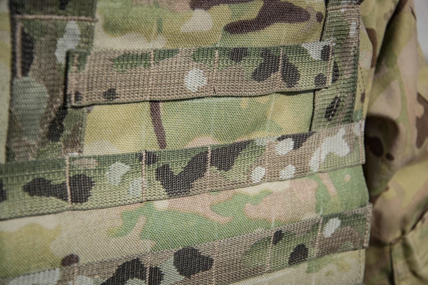 Close up of army uniform on the soldier photo