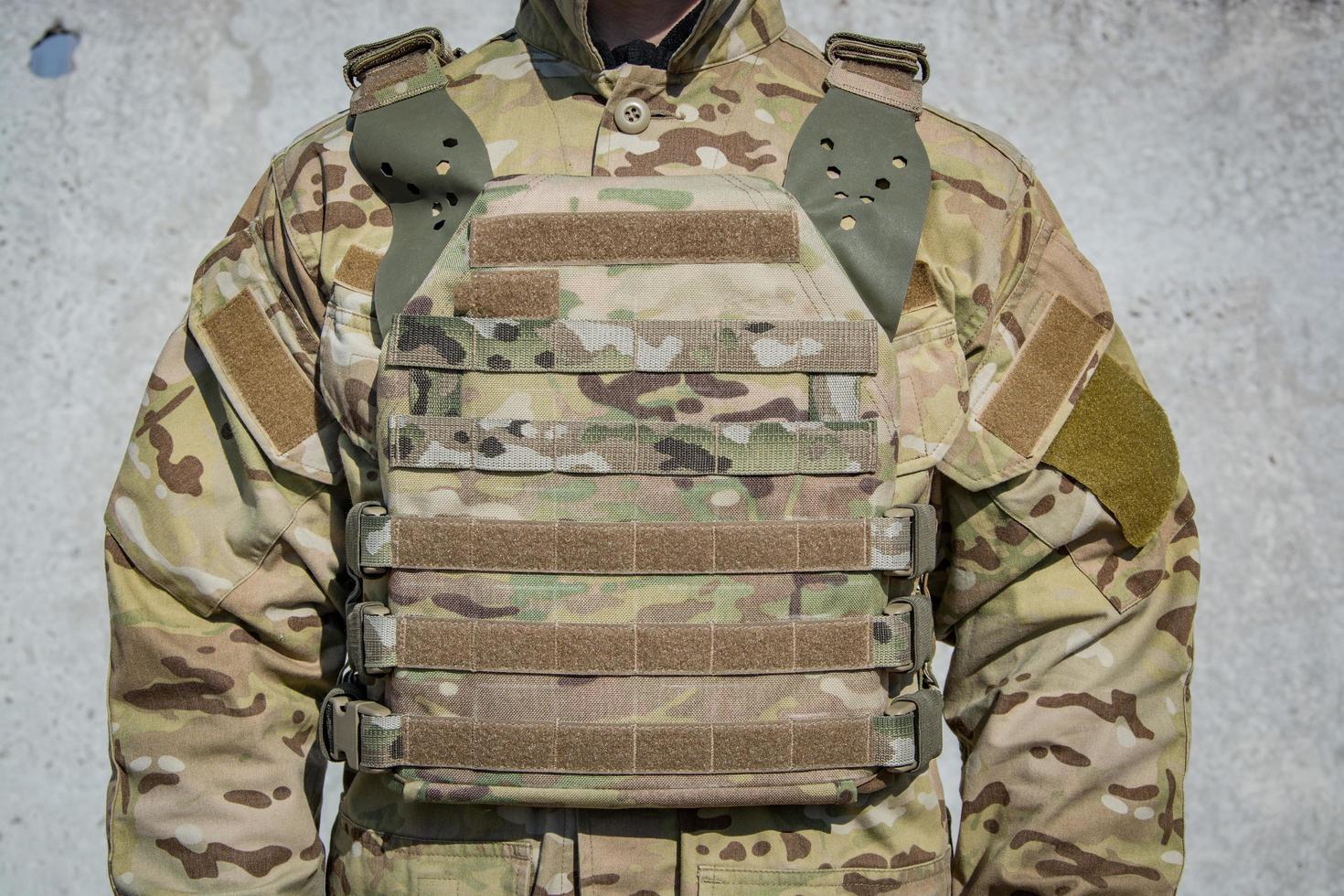Close up of army uniform on the soldier photo