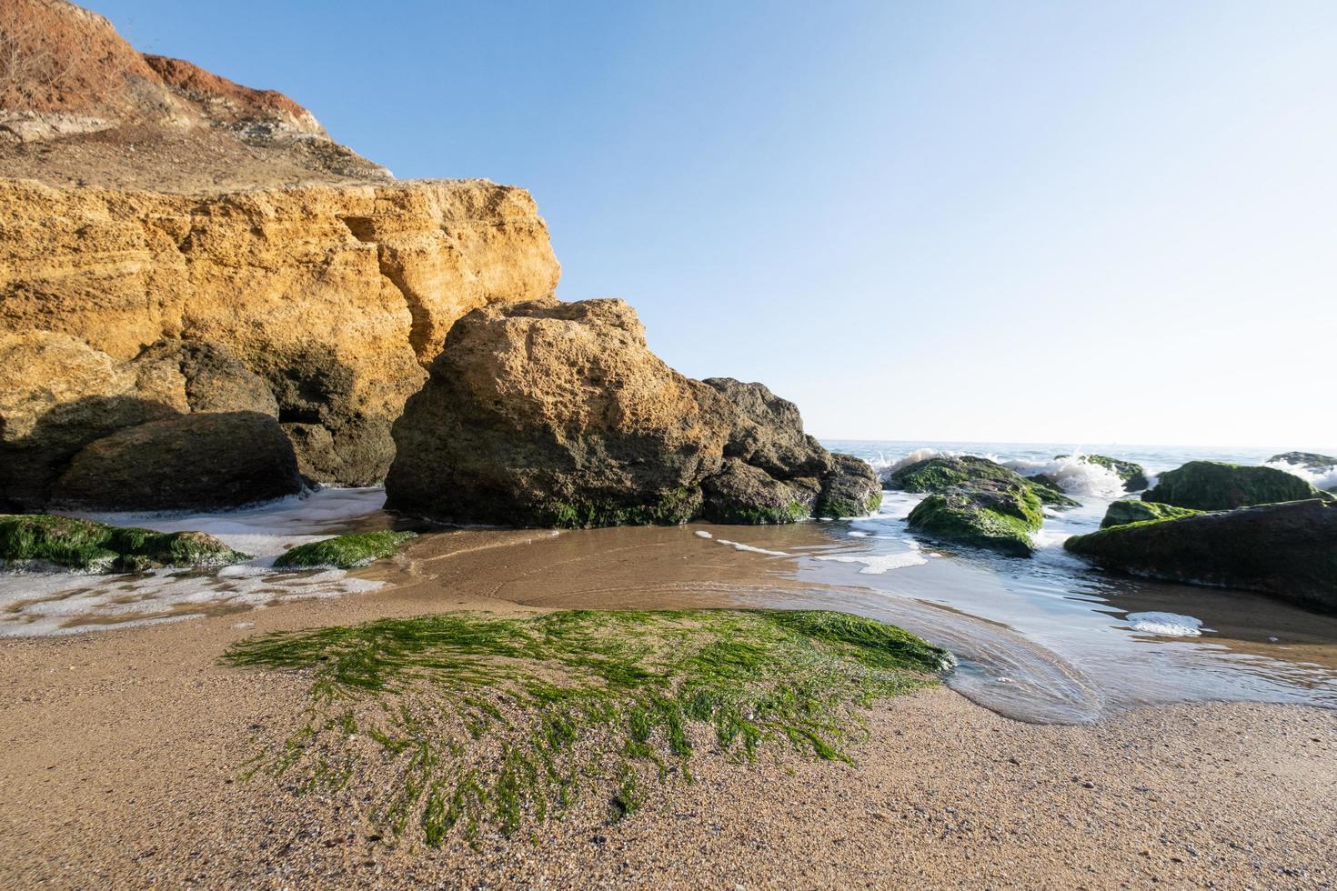 Beautiful landscape with sunset, cliffs and sea photo