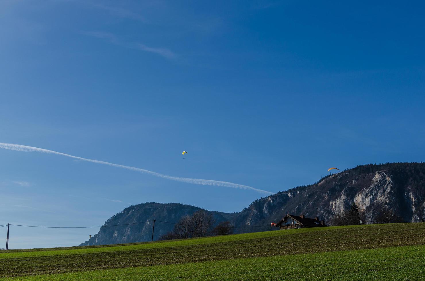 paragliders in nature photo