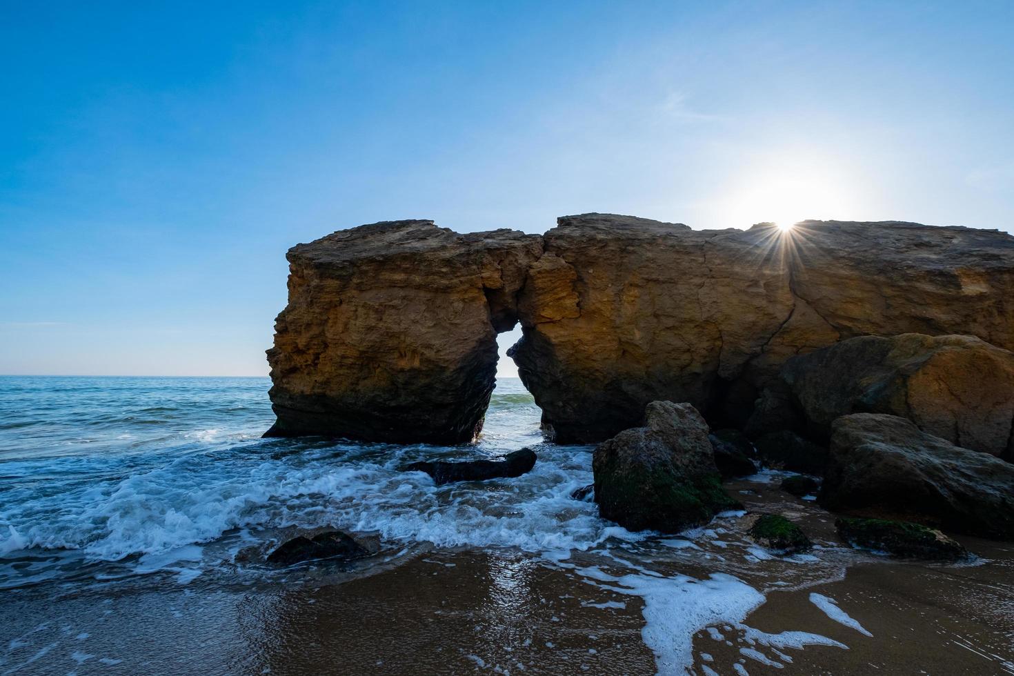 Beautiful landscape with sunset, cliffs and sea photo