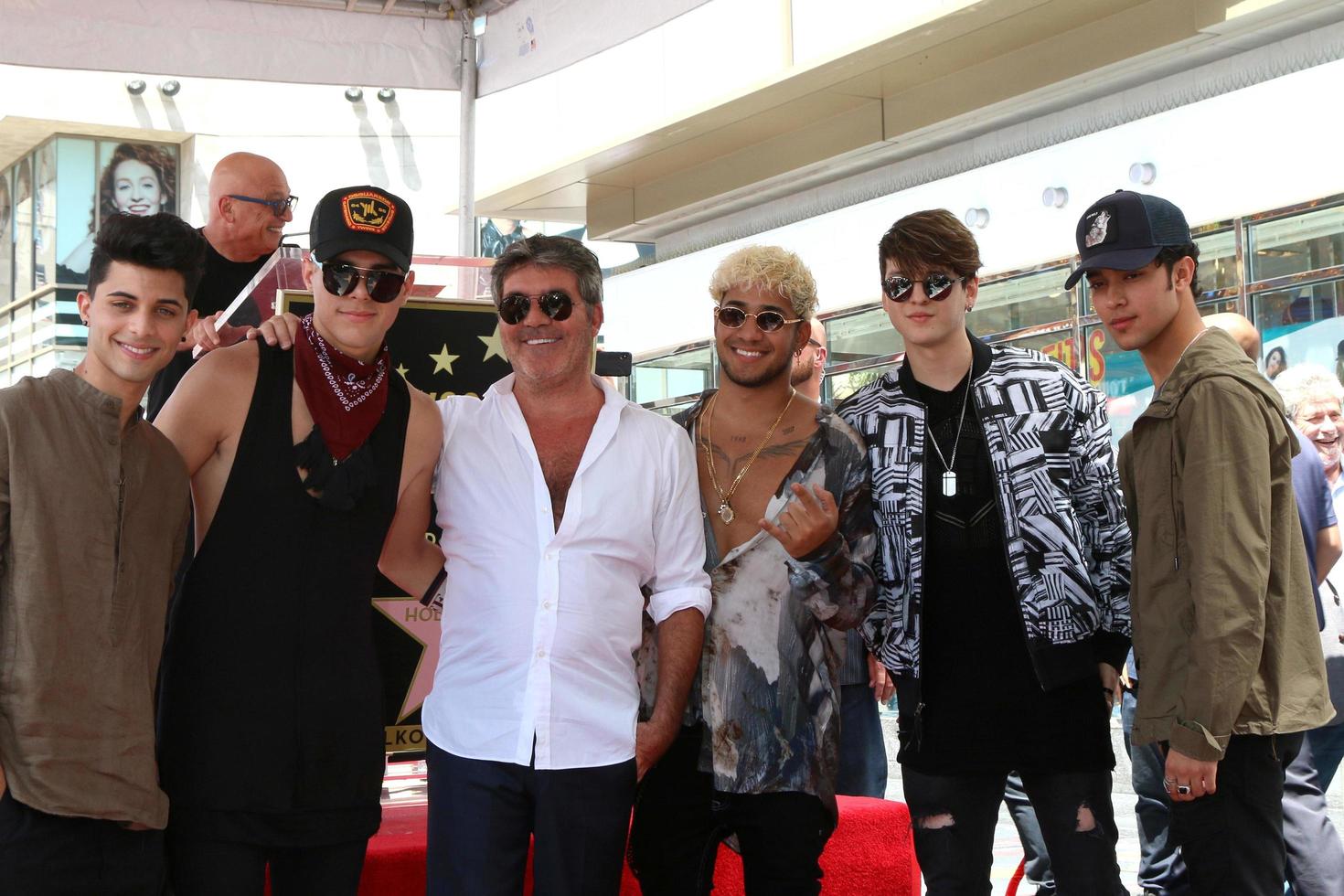 LOS ANGELES, AUG 22 - CNCO, Simon Cowell at the Simon Cowell Star Ceremony on the Hollywood Walk of Fame on August 22, 2018 in Los Angeles, CA photo