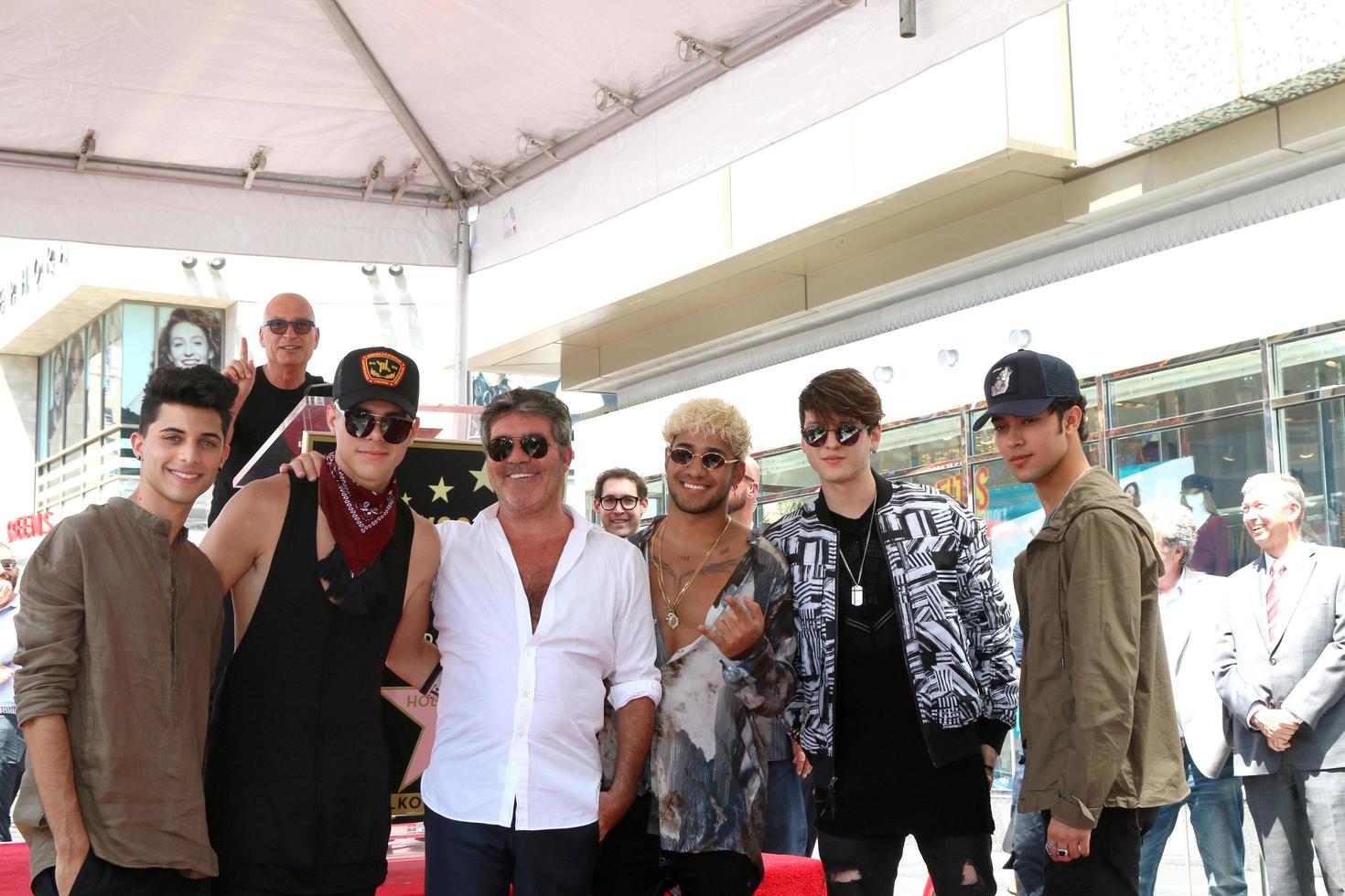 LOS ANGELES, AUG 22 - CNCO, Simon Cowell at the Simon Cowell Star Ceremony on the Hollywood Walk of Fame on August 22, 2018 in Los Angeles, CA photo