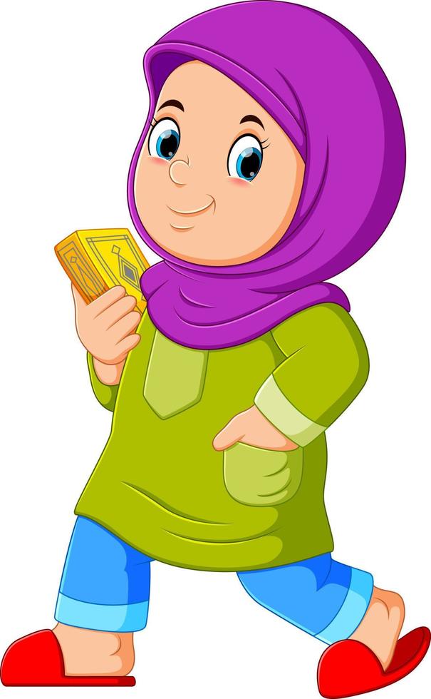 Moslem girl walking and carrying holy Quran vector