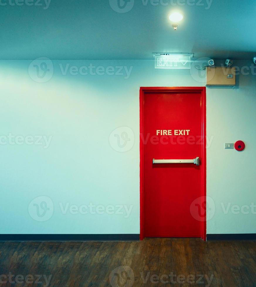 Fire exit door. Fire exit emergency door red color metal material photo