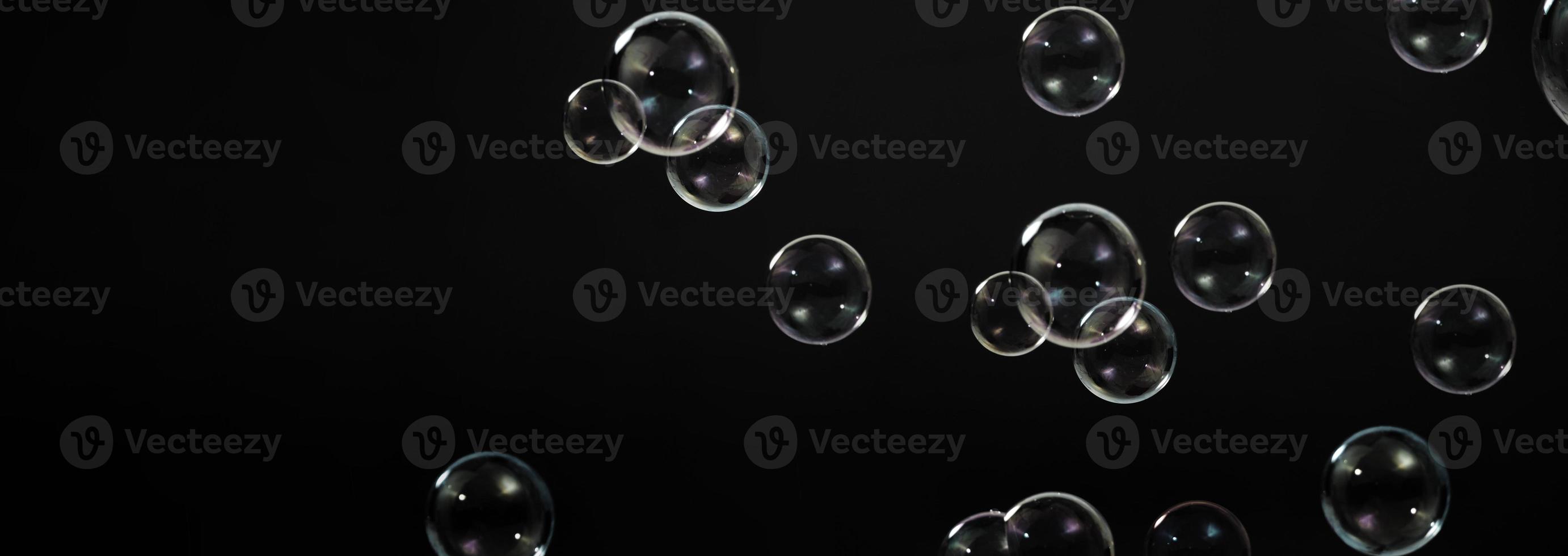 Soap bubble drop or Shampoo bubbles floating like flying in the air photo