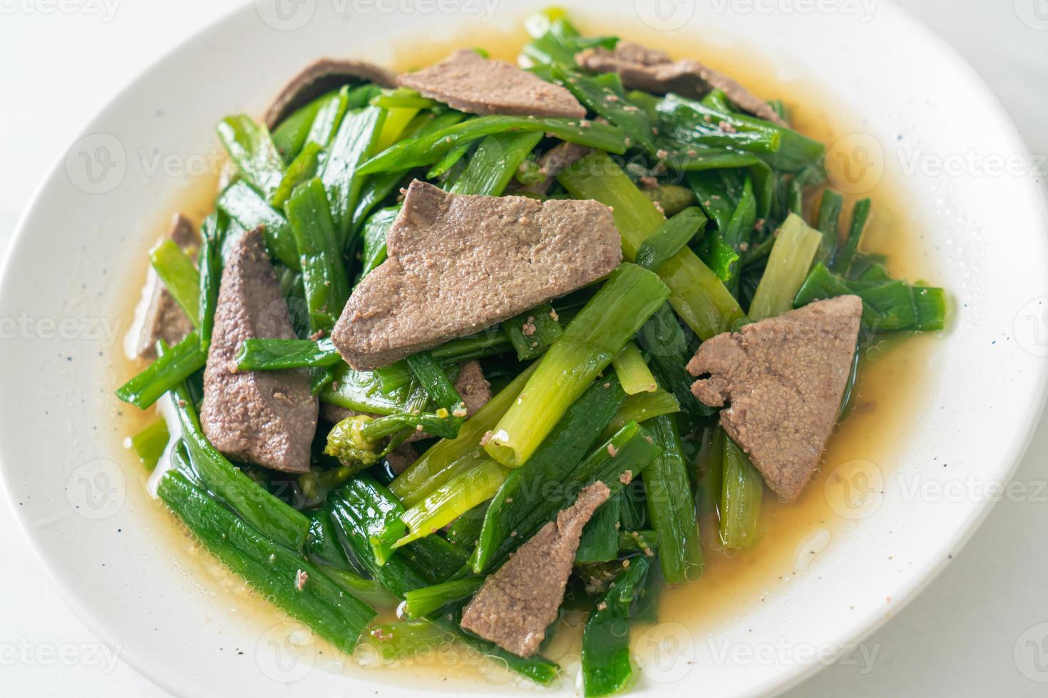 Stir-fried onion flower stem with pork liver photo