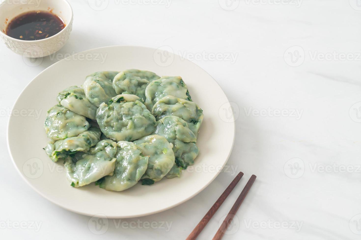 steamed chives dumplings with sauce photo