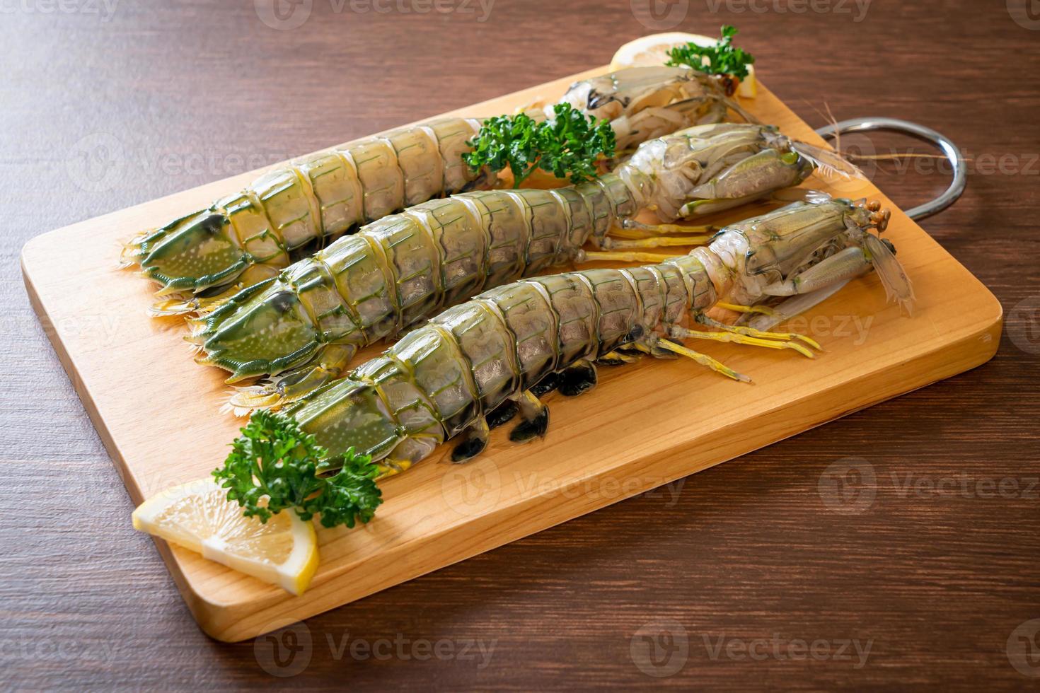 fresh mantis shrimp with lemon photo