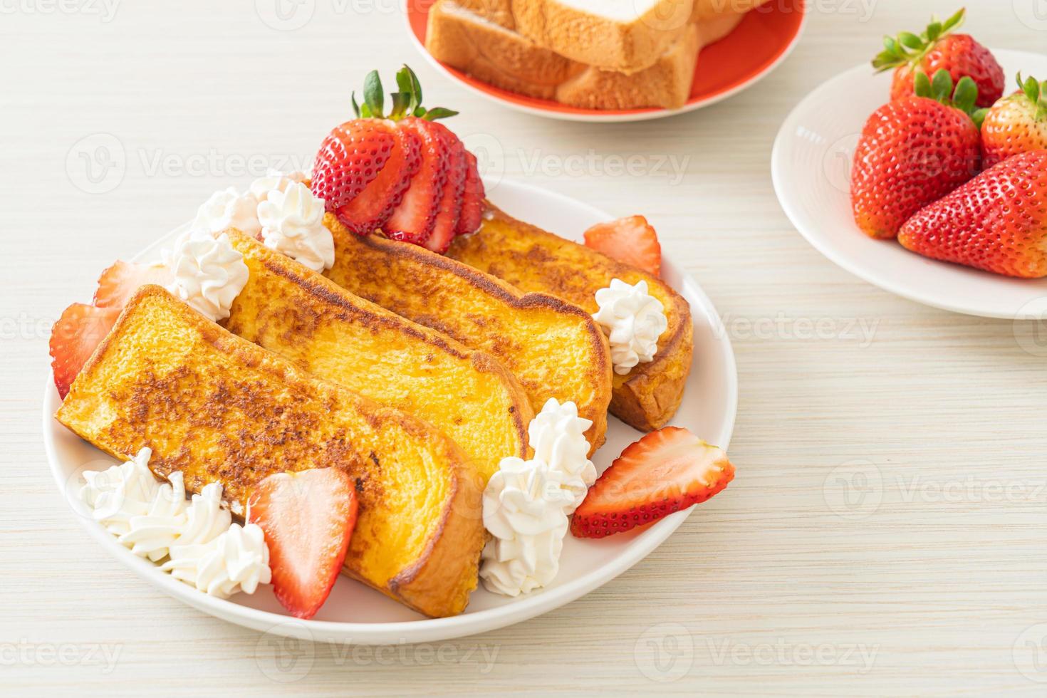 french toast with fresh strawberry and whipping cream photo