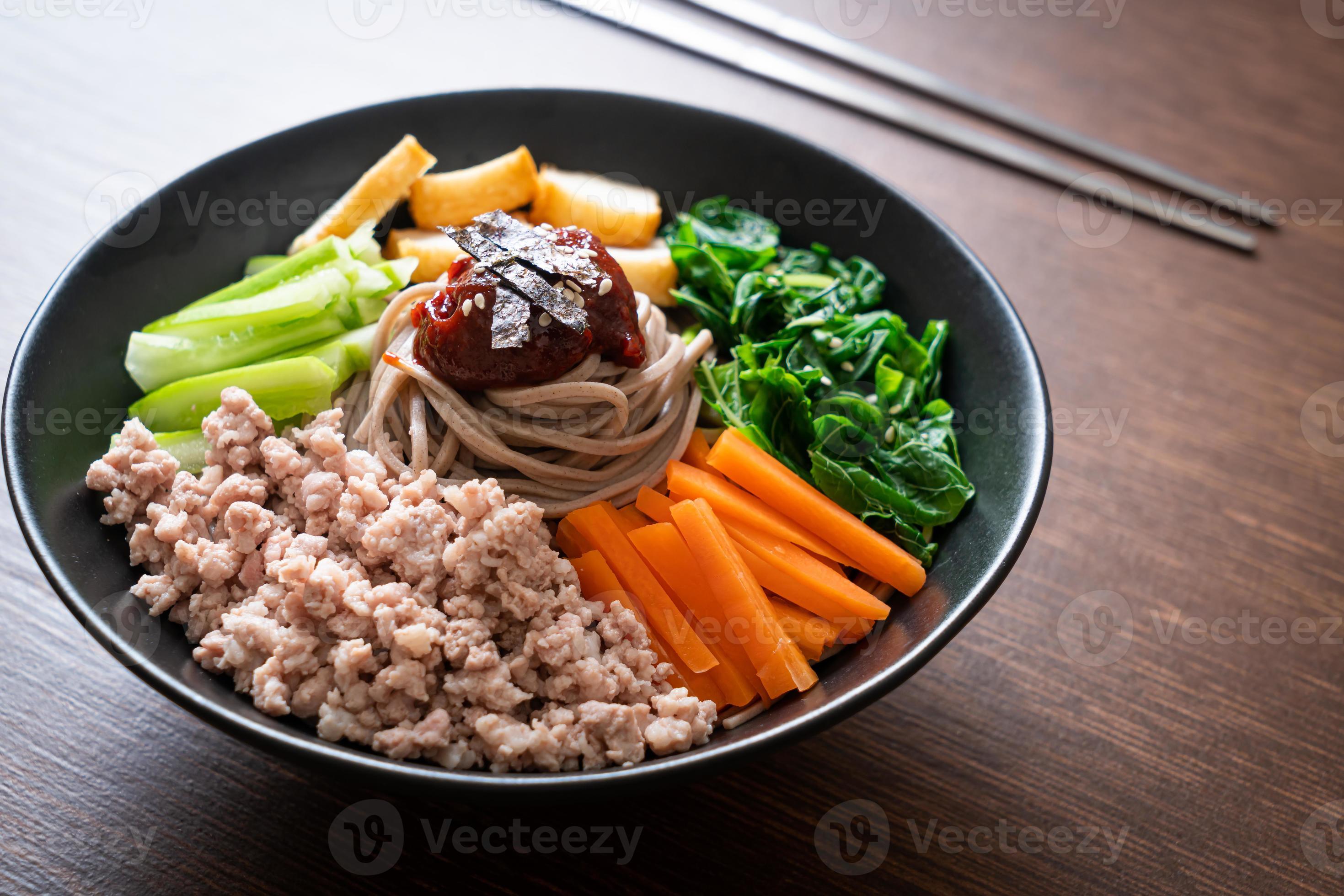 Korean spicy cold noodles 7580627 Stock Photo at Vecteezy