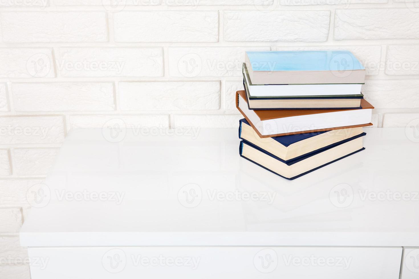 Workplace and education accessories on white table. Selective focus and copy space. Business school concept photo