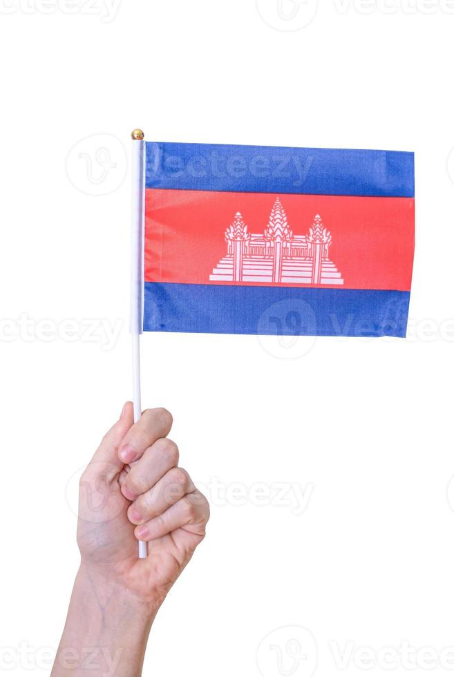 A hand holds the flag The flag of Cambodia on a white isolated background. photo