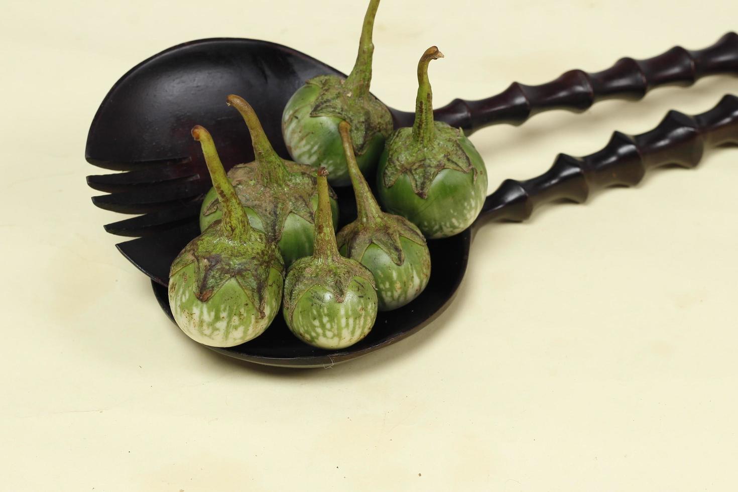 Eggplant is one of the vegetables in the form of fruit. Fruit-producing plants used as vegetables. Green eggplant is round and mini has a different taste from other eggplants. photo
