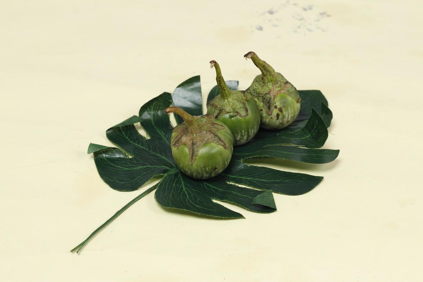 Eggplant is one of the vegetables in the form of fruit. Fruit-producing plants used as vegetables. Green eggplant is round and mini has a different taste from other eggplants. photo