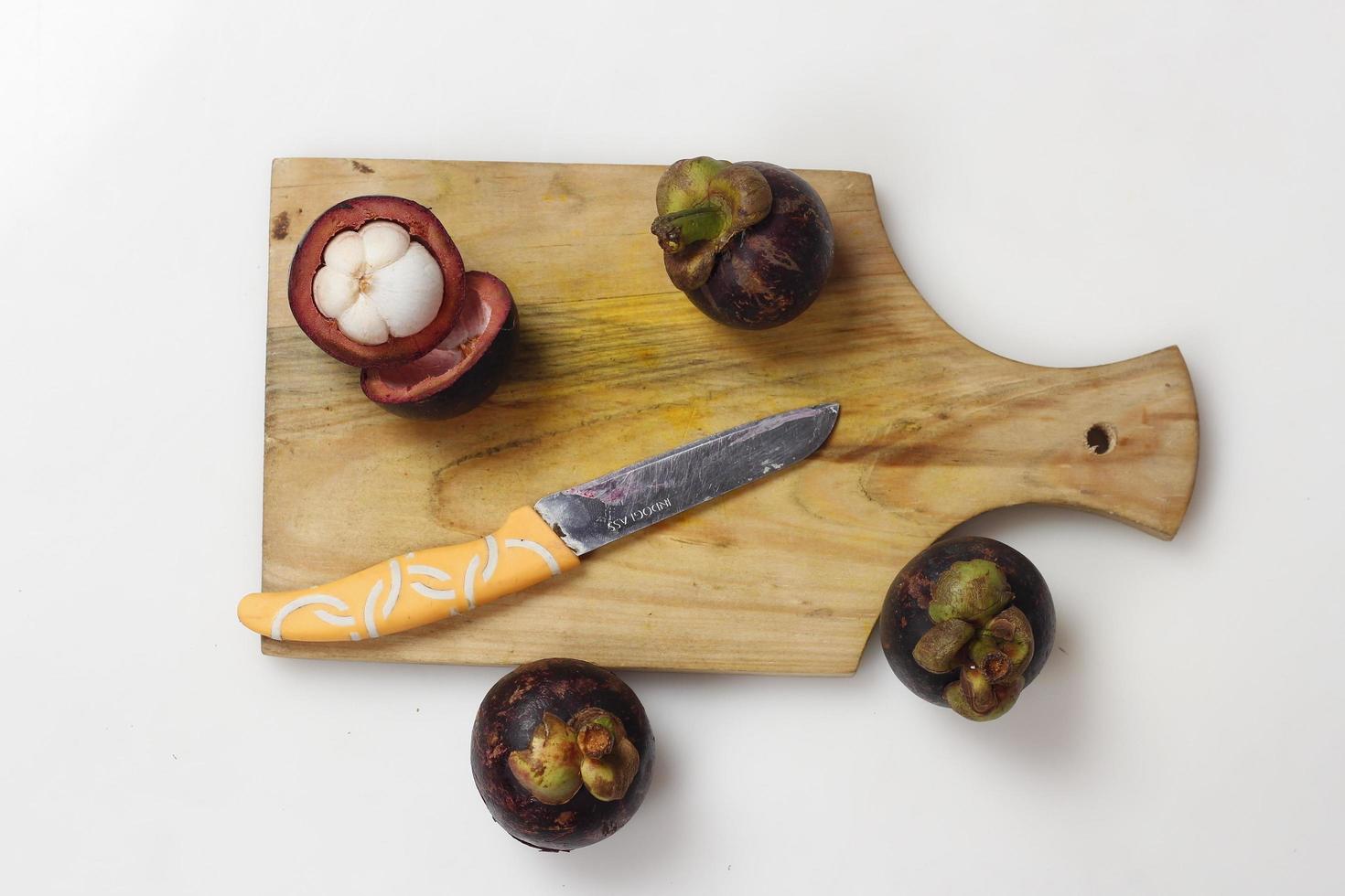 Mangosteen is a tropical fruit from Asia. Mangosteen has a distinctive sweet and sour taste. Mangosteen also has a myriad of benefits, properties, and nutritional content that is useful for health. photo