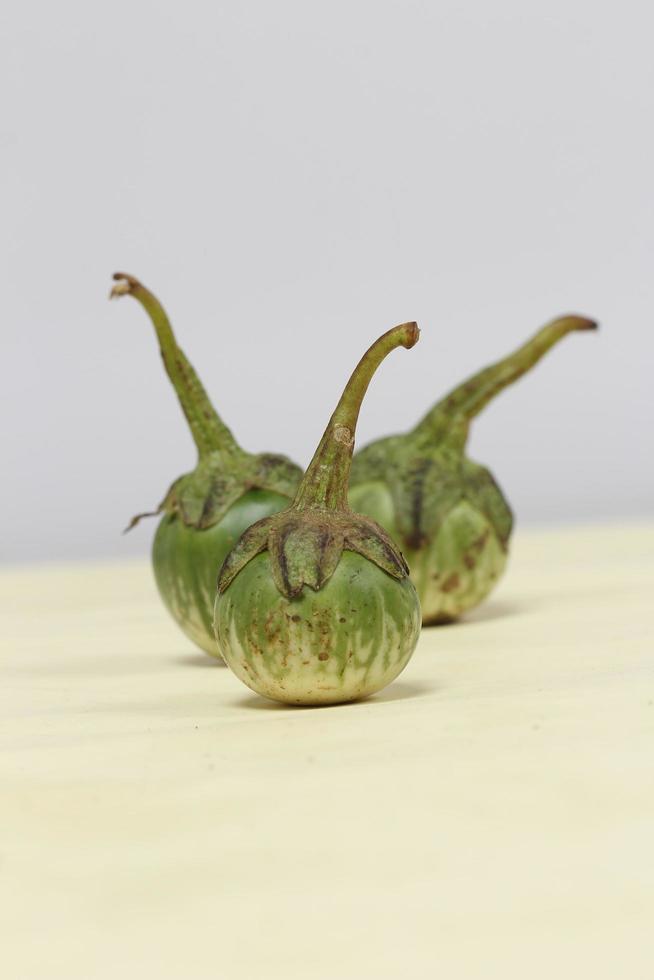 Eggplant is one of the vegetables in the form of fruit. Fruit-producing plants used as vegetables. Green eggplant is round and mini has a different taste from other eggplants. photo