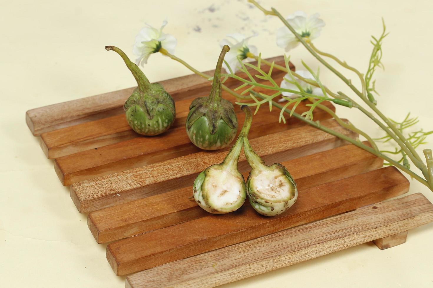 Eggplant is one of the vegetables in the form of fruit. Fruit-producing plants used as vegetables. Green eggplant is round and mini has a different taste from other eggplants. photo