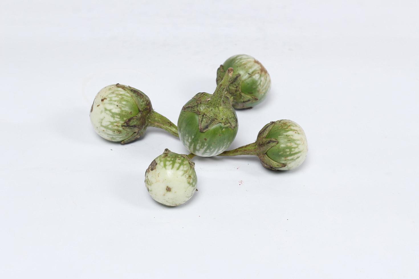 Eggplant is one of the vegetables in the form of fruit. Fruit-producing plants used as vegetables. Green eggplant is round and mini has a different taste from other eggplants. photo