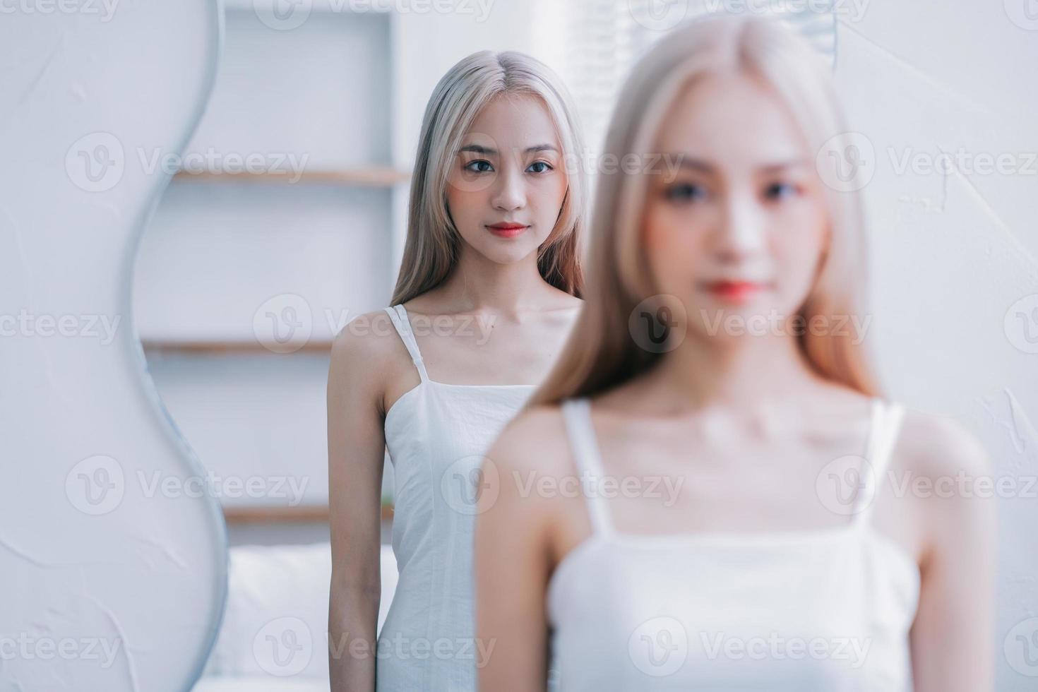 Young Asian girl with mental health problems, multiple personalities photo