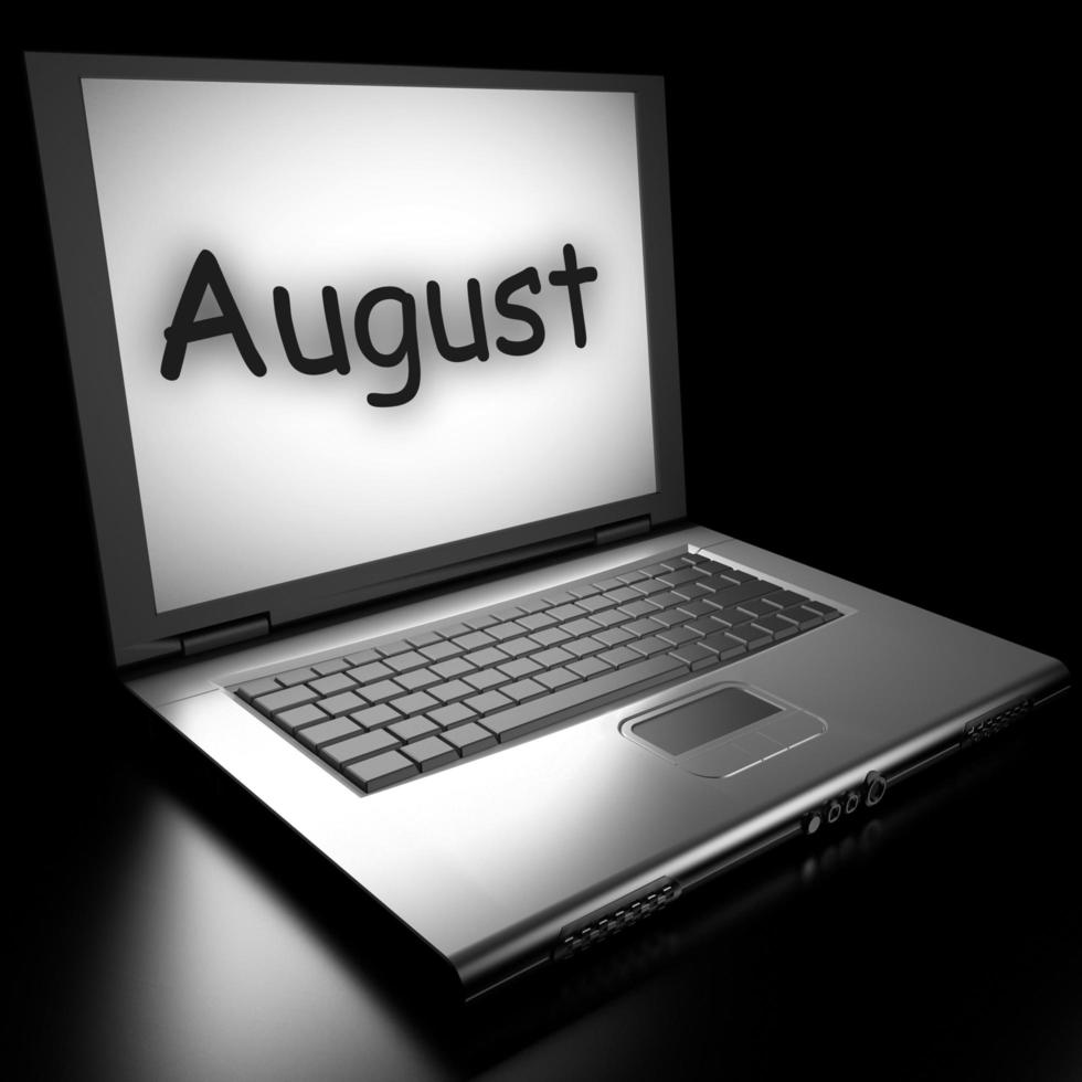 August word on laptop photo
