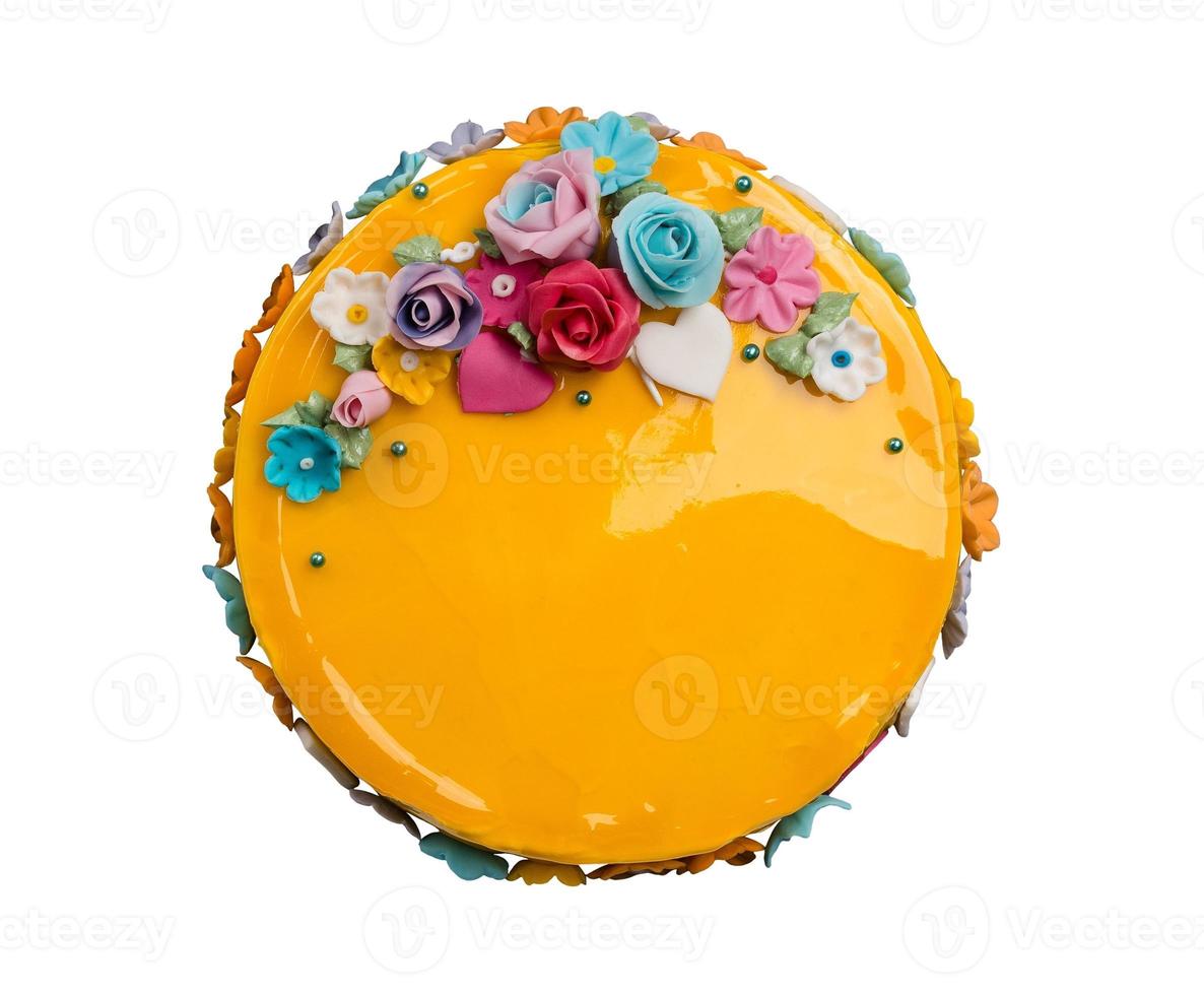 Top view Mango jam cake decorations with Colorful Icing fruits photo