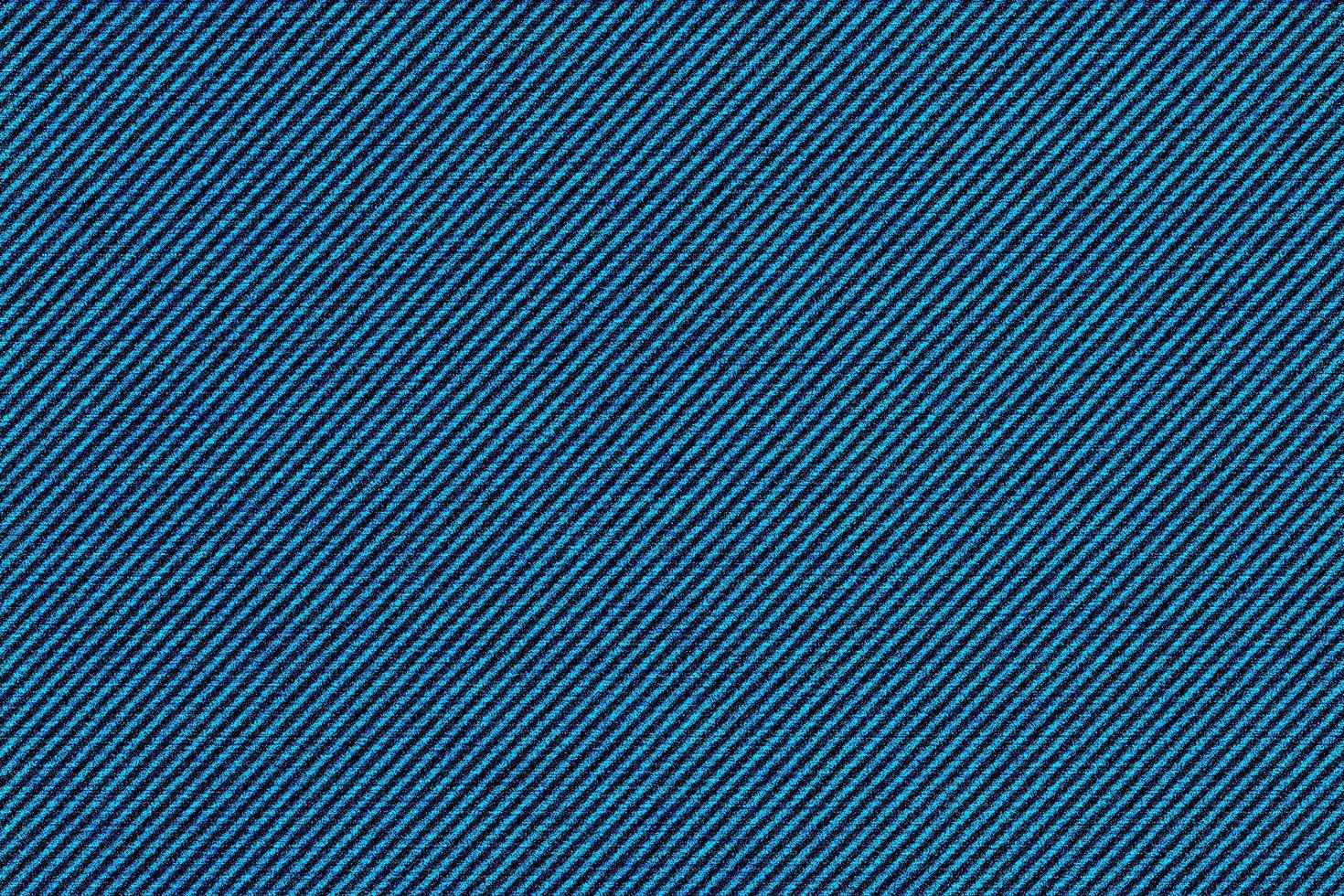 Dark Blue denim fabric texture background, the strong cotton cloth used especially to make jeans. photo