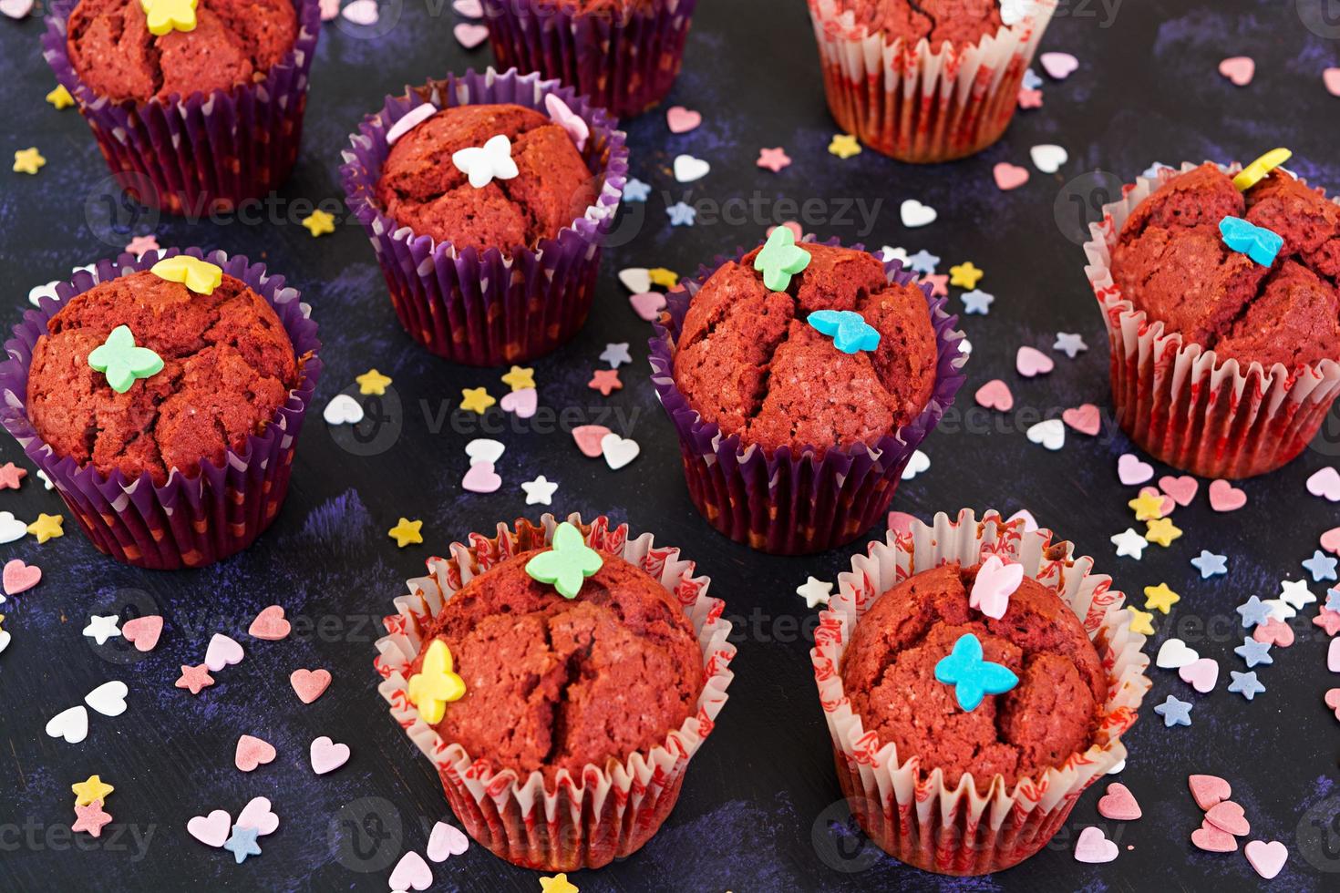 Chocolate muffins on dark background photo