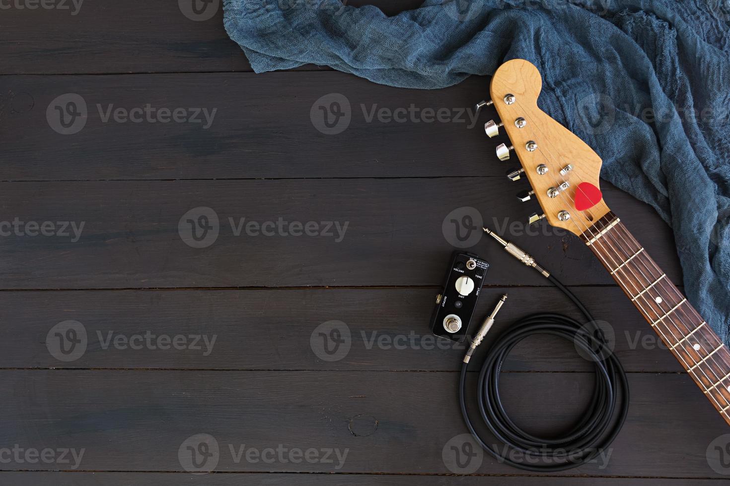 Electric guitar on dark background photo