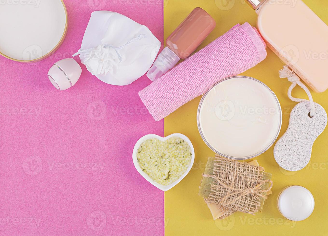Set cosmetics SPA.  Mockup on pink-yellow background, place you design. Top view photo