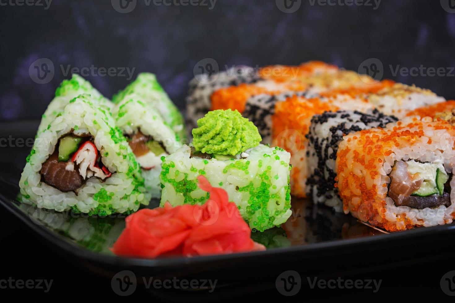 Sushi roll on dark background photo