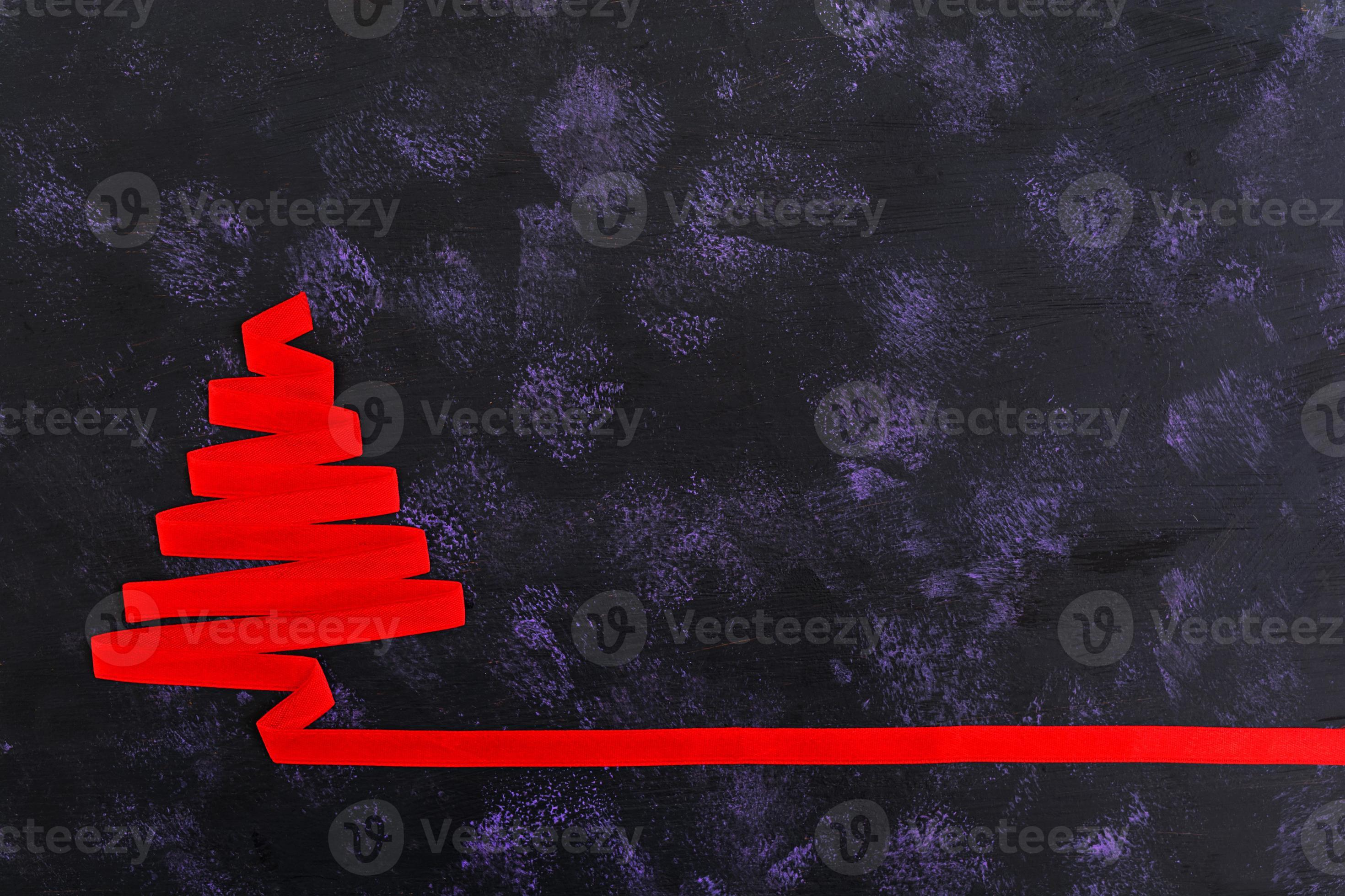 Christmas tree made of ribbon on dark background. 7590296 Stock Photo