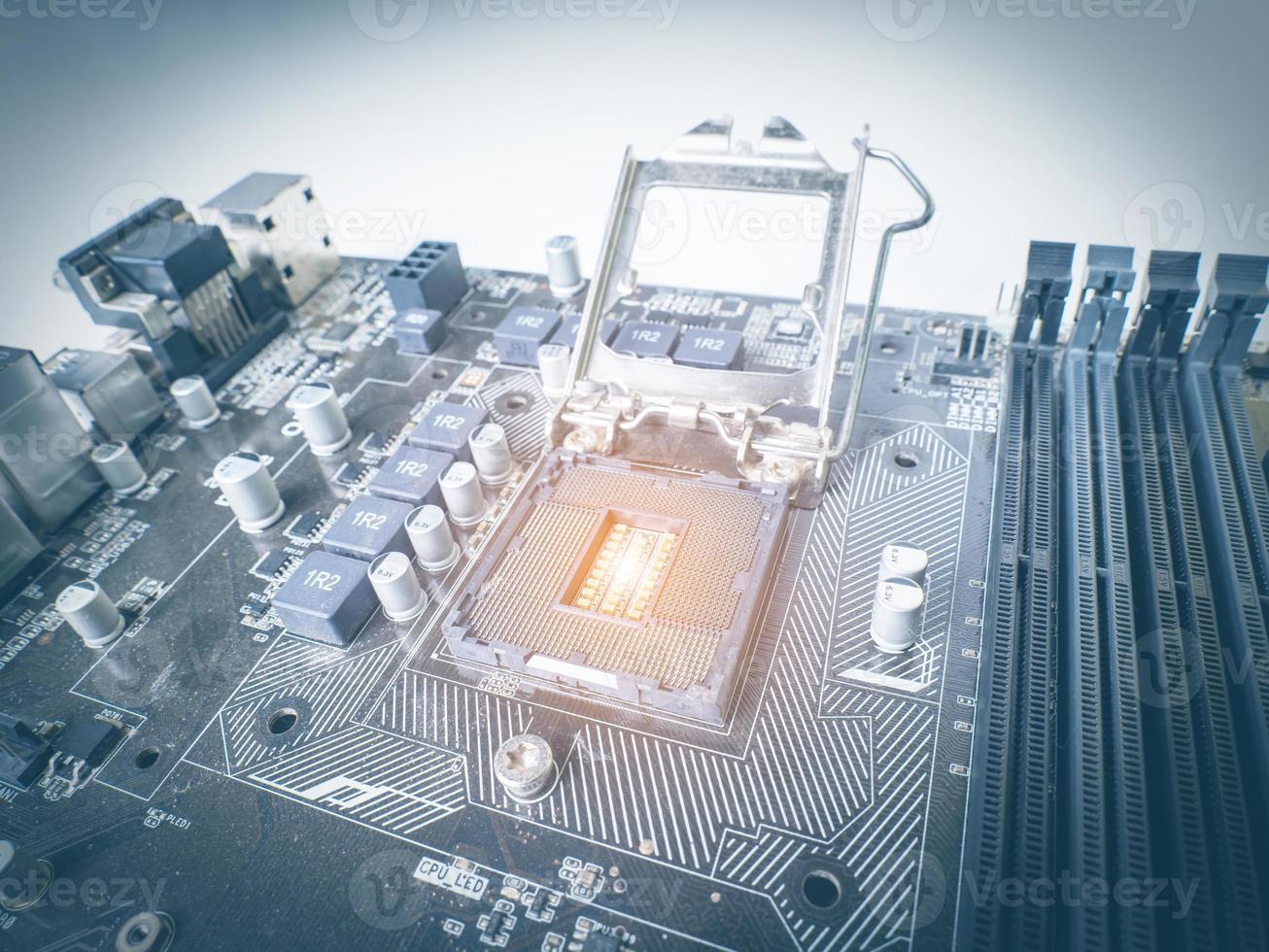 CPU motherboard slot for cooling, old mainboard, lots of dust, put orange light for warm tones, at the cpu slot, there is a RAM slot next to it, there is a capacitor photo