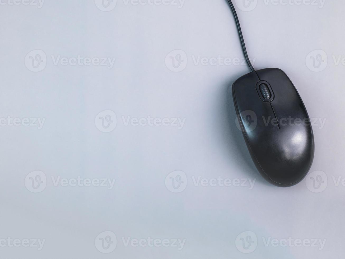 old black wired mouse Left and right click buttons Ready to use. There is a gray active area. There is a copy space to insert text. Business, shopping and gaming photo