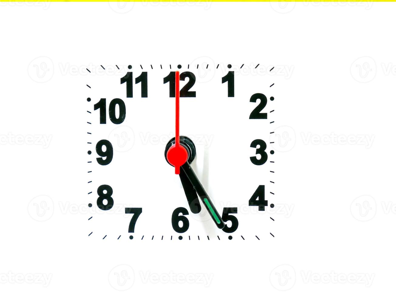 clock showing time on a white background photo