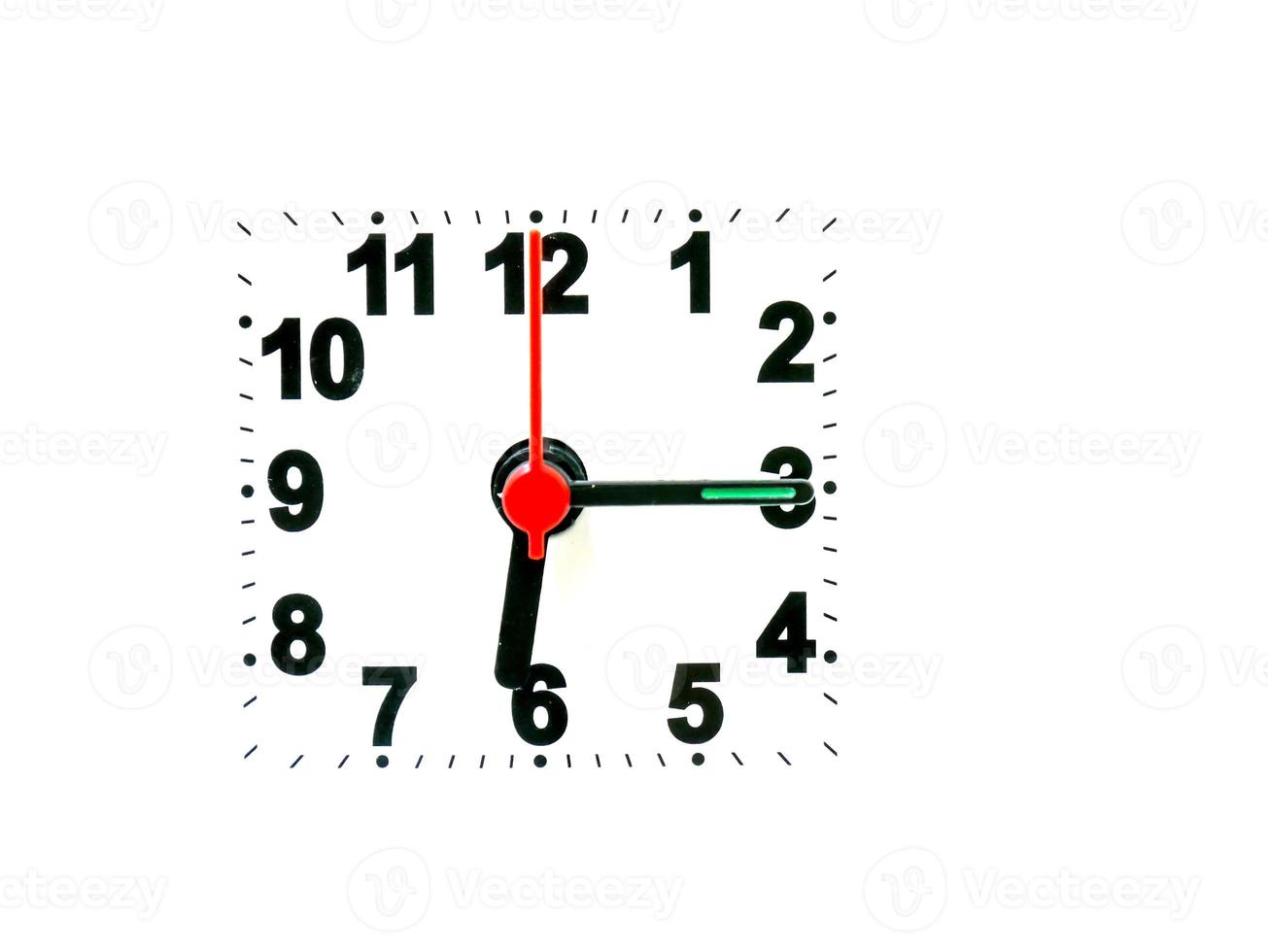 clock showing time on a white background photo