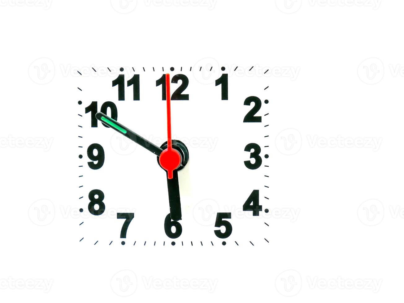 clock showing time on a white background photo