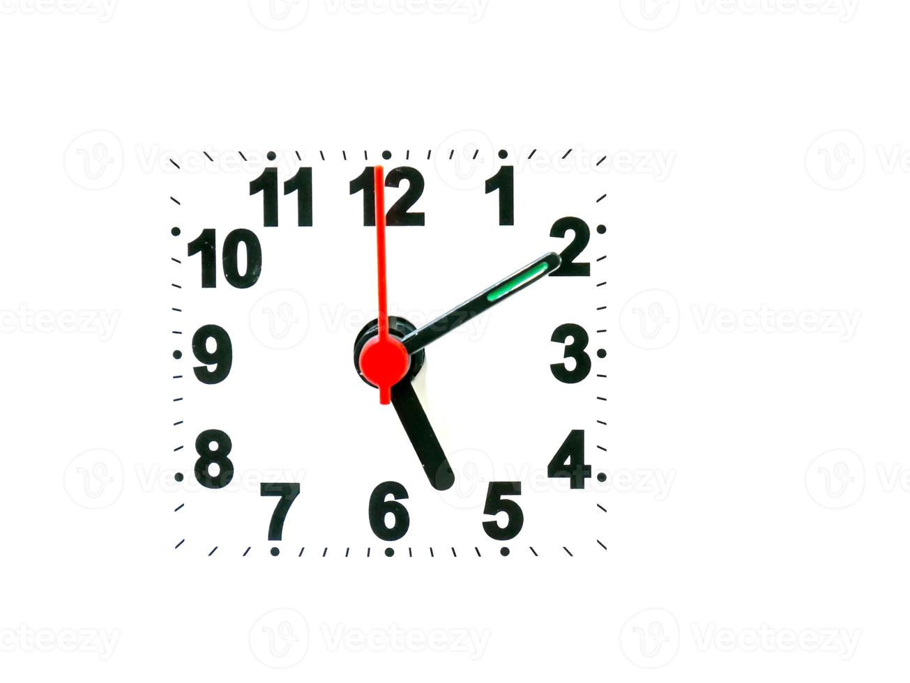clock showing time on a white background photo