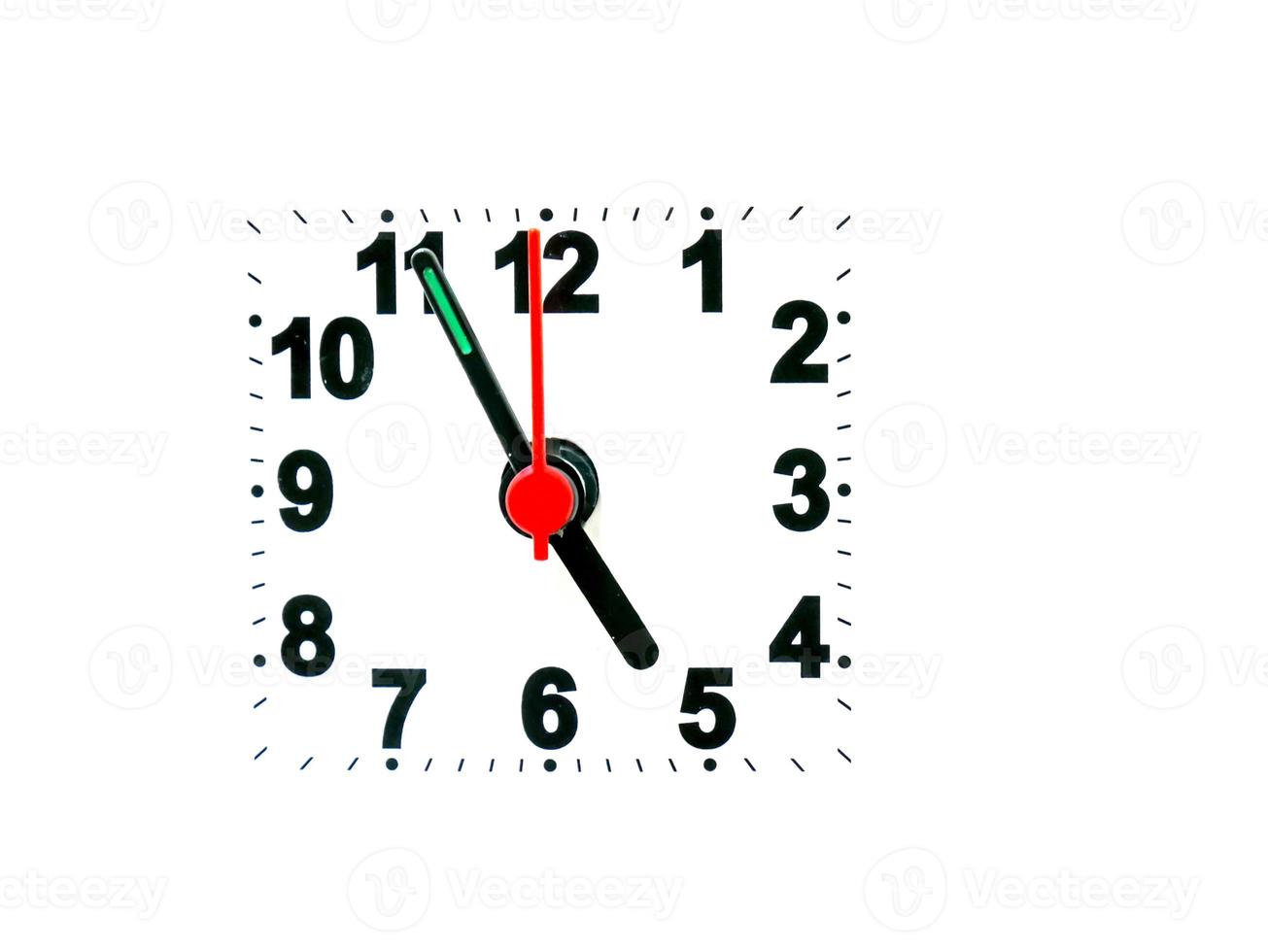 clock showing time on a white background photo