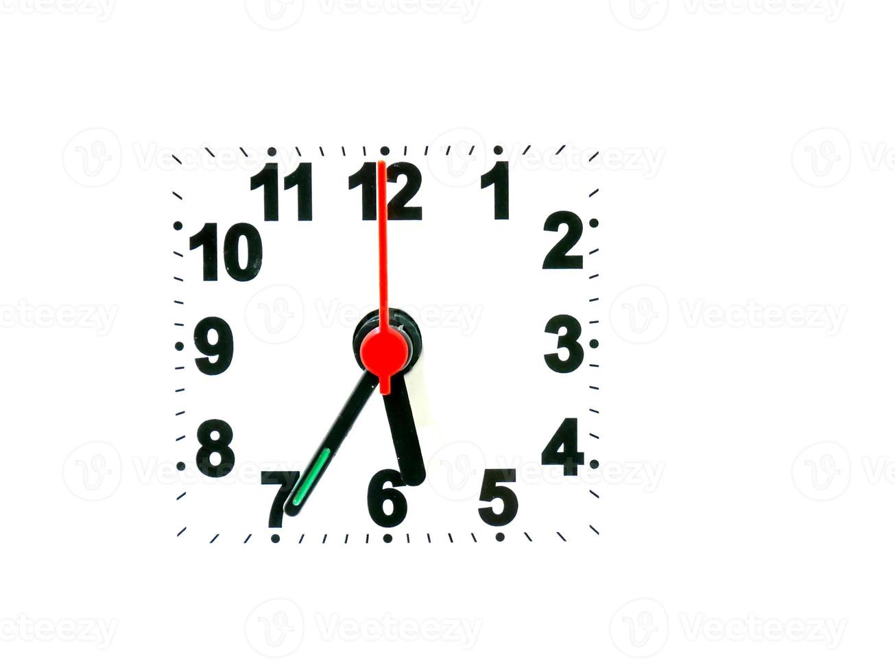 clock showing time on a white background photo