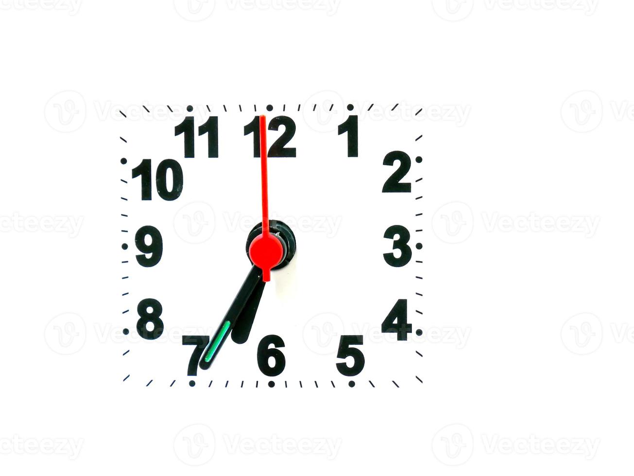clock showing time on a white background photo