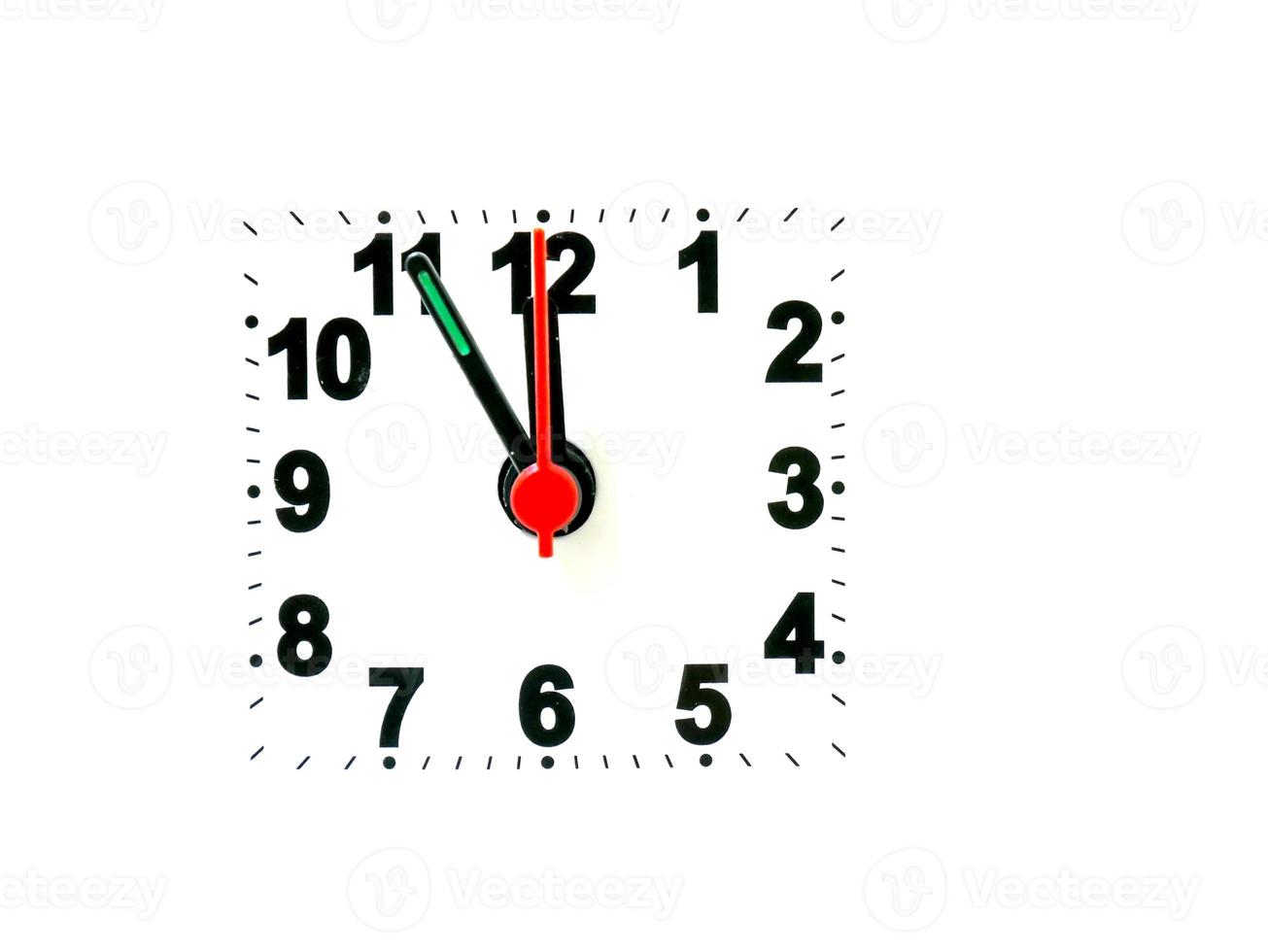 clock showing time on a white background photo