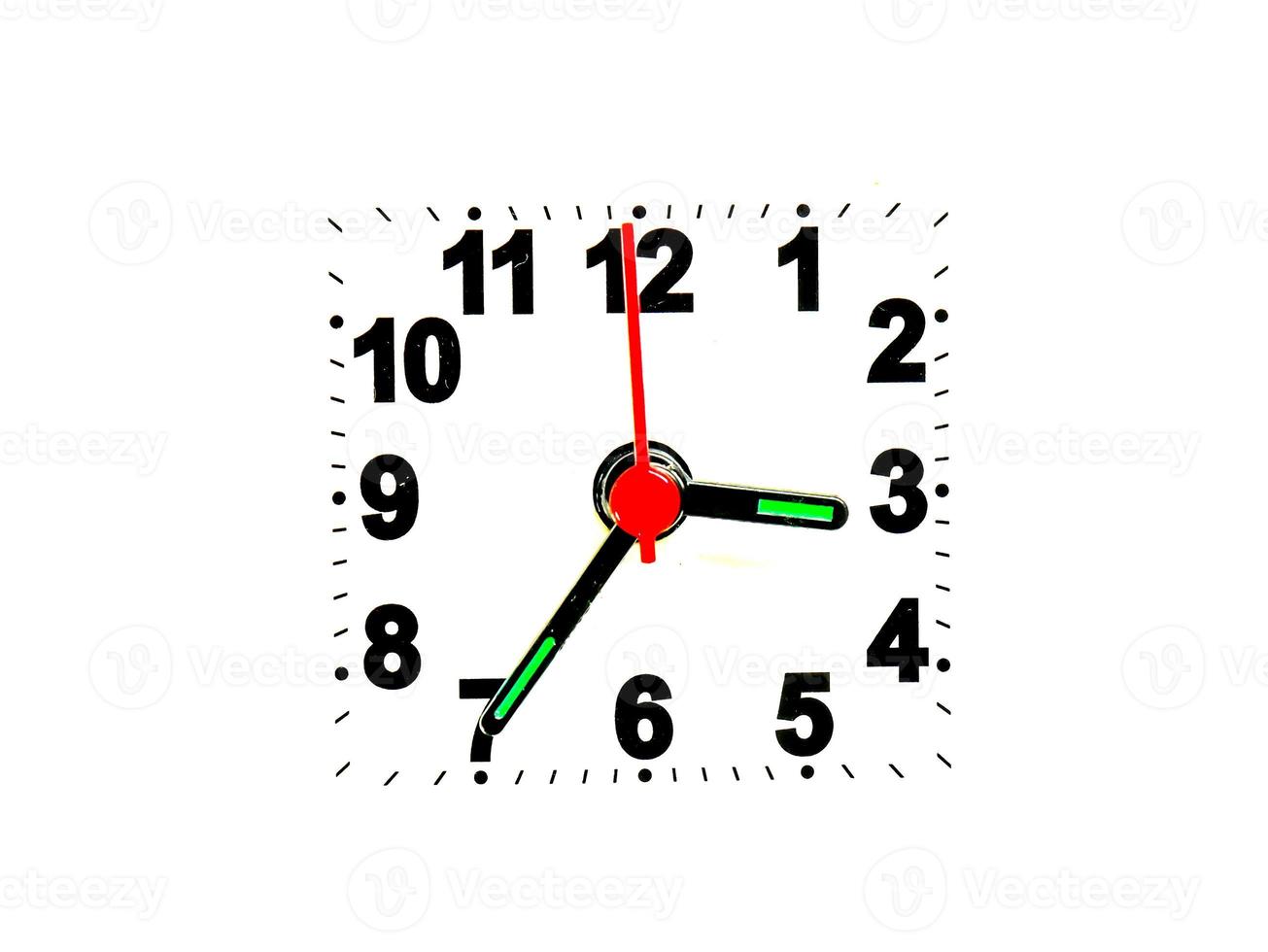 clock showing time on a white background photo