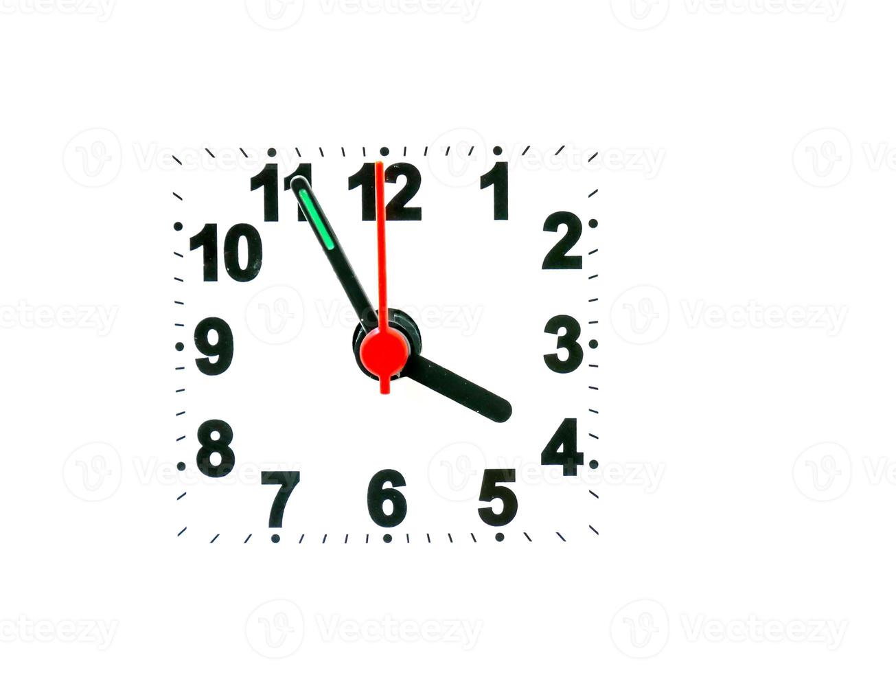 clock showing time on a white background photo