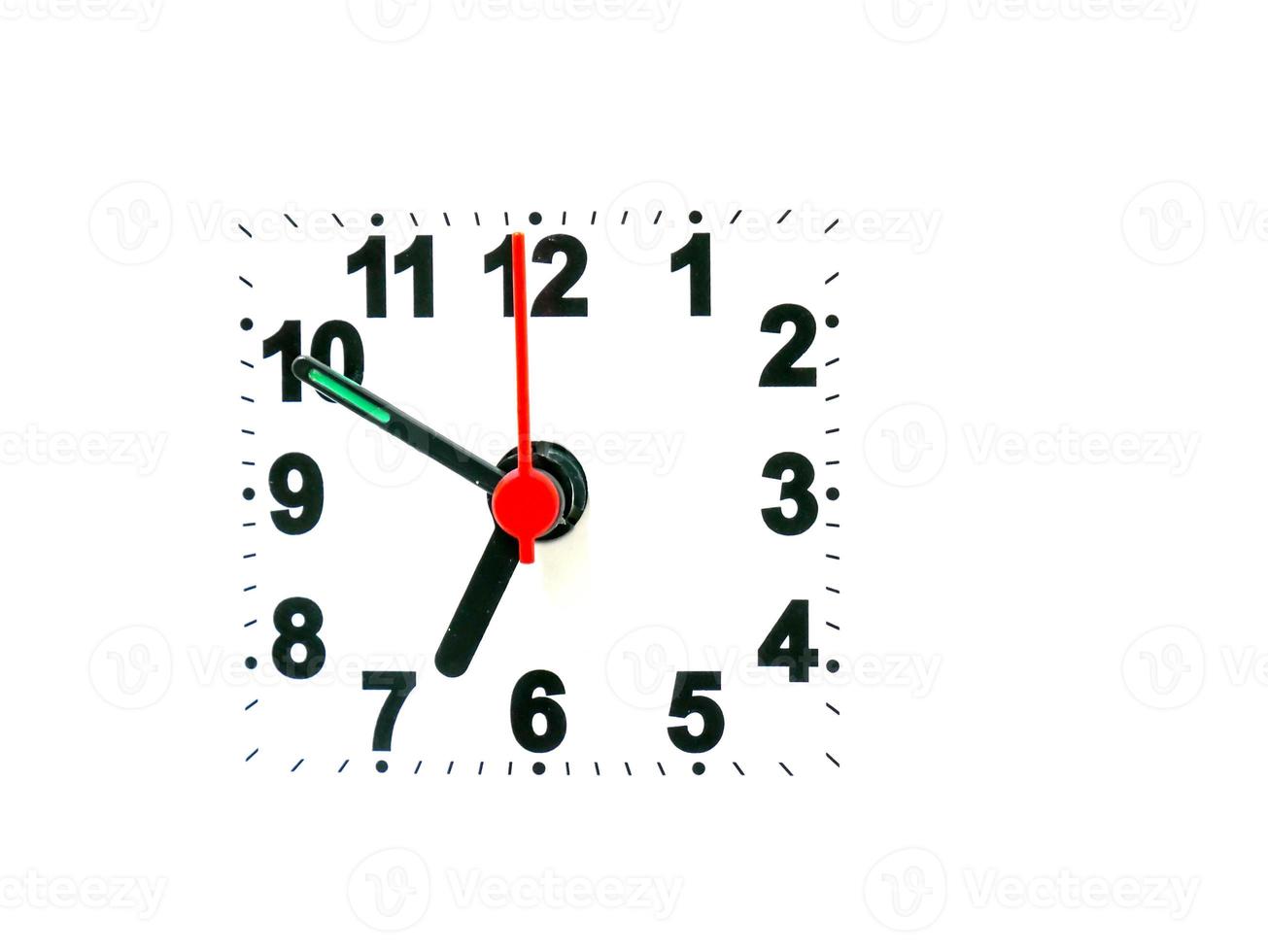 clock showing time on a white background photo