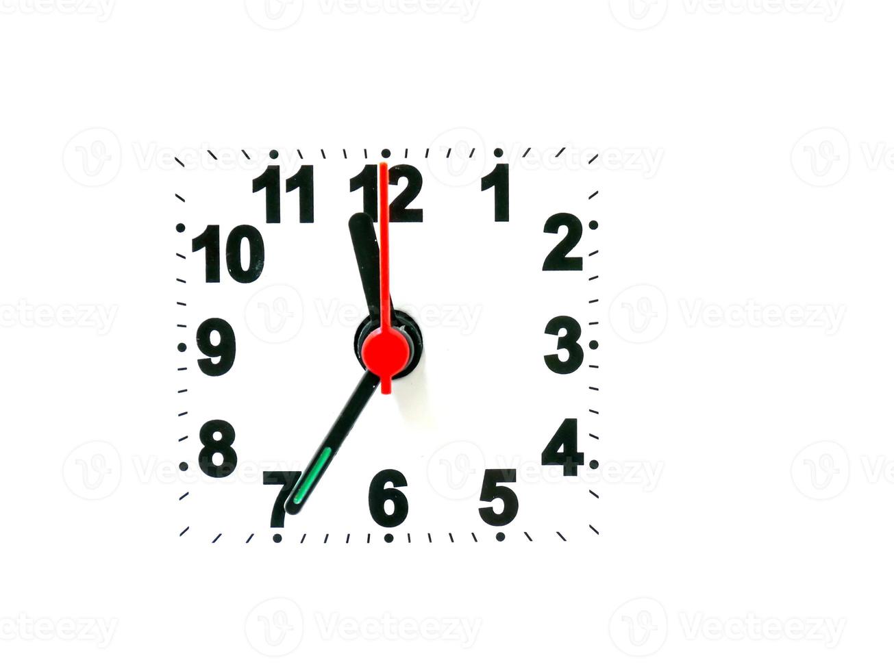 clock showing time on a white background photo