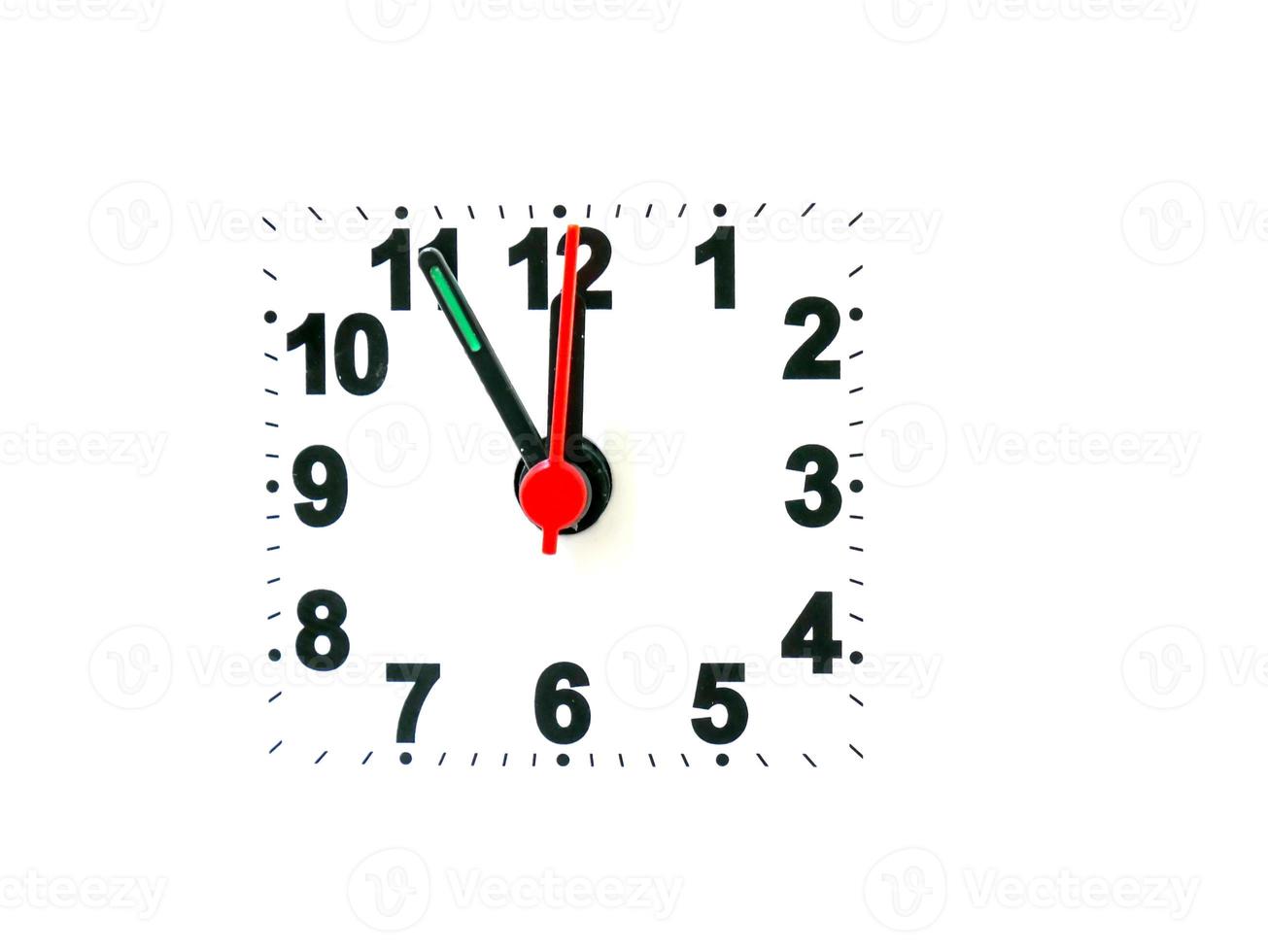 clock showing time on a white background photo